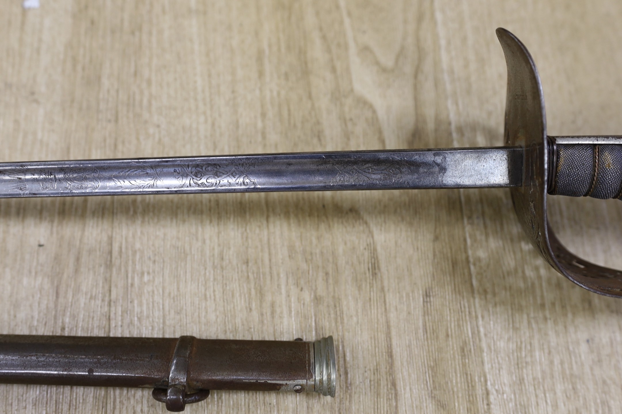 A George V officers sword with scabbard and a bayonet, sword100cm long